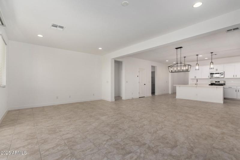 Living area and view of kitchen
