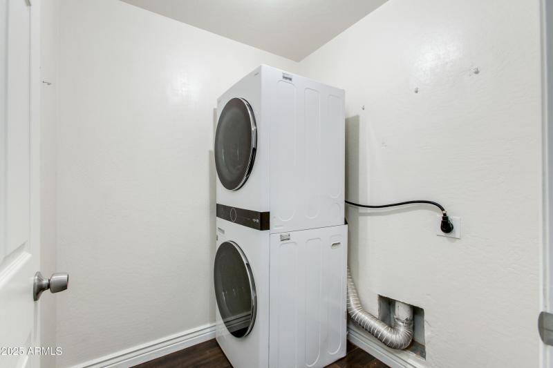 Laundry room located downstairs
