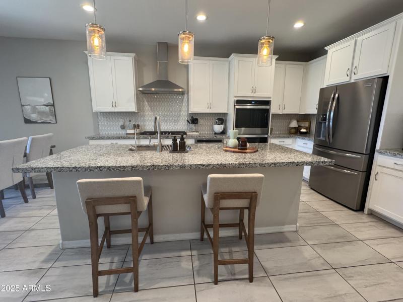 Bright Kitchen with Bar Seating