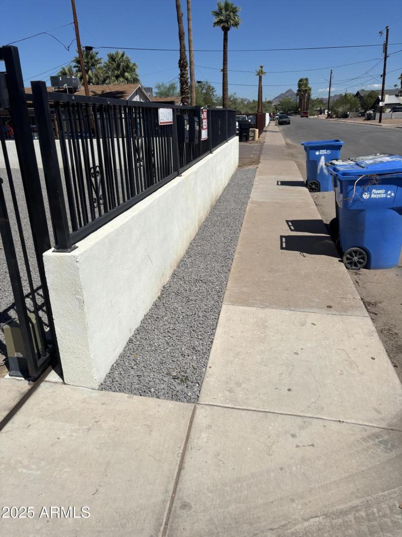 Gravel landscape on front sidewalk