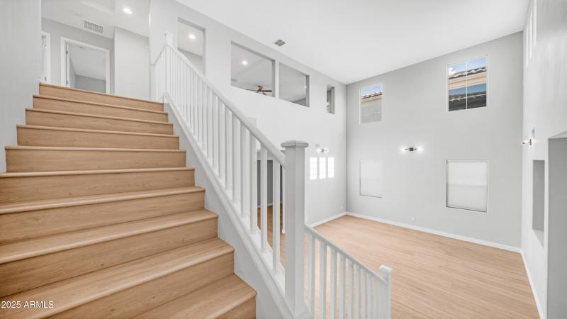 Spacious Stairway with Kick Lights