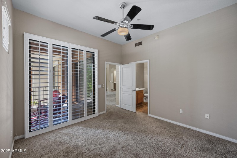 Guest bedroom open out to patio.