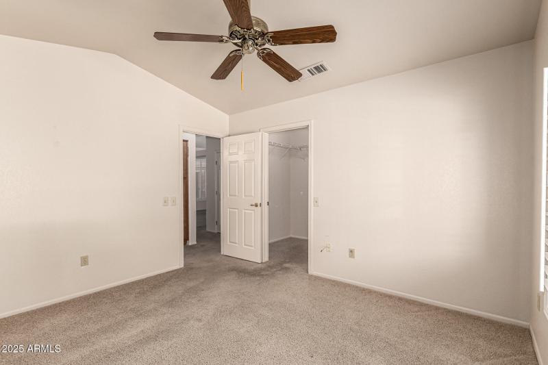 Guest bedroom with walk in closet