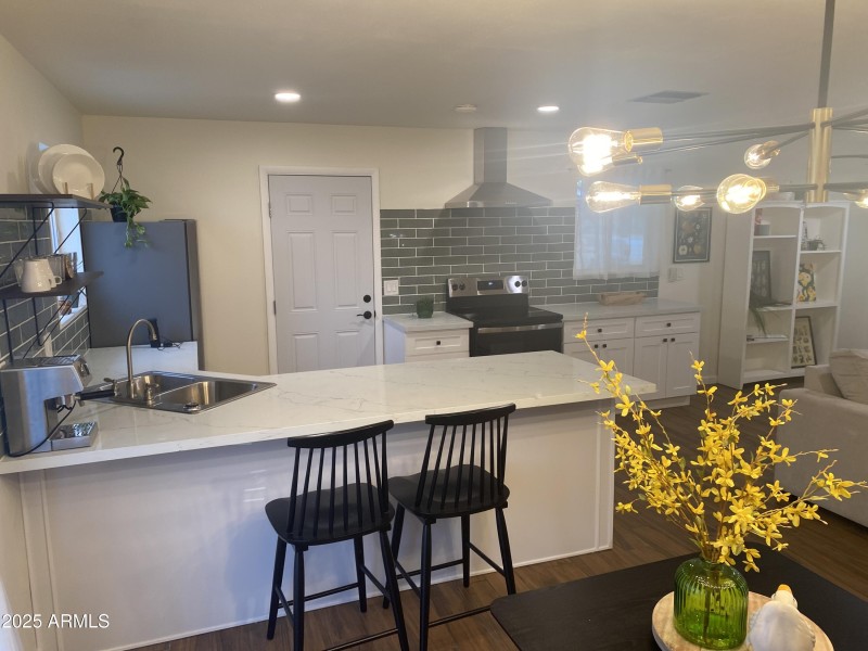 Dining to kitchen and open office