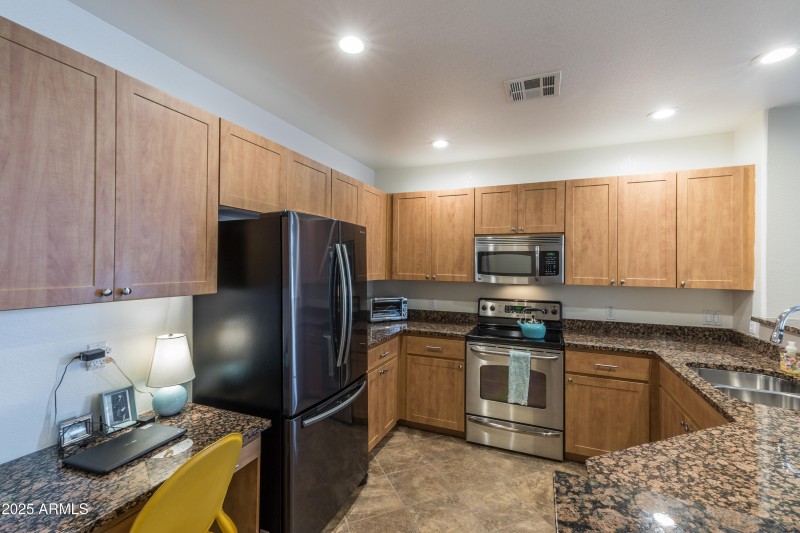 OPEN KITCHEN W AMPLE STORAGE SPACE.