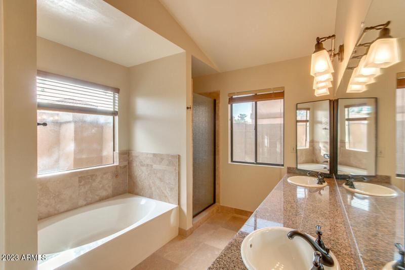 16. MASTER BATHROOM WITH TUB AND SHOWER