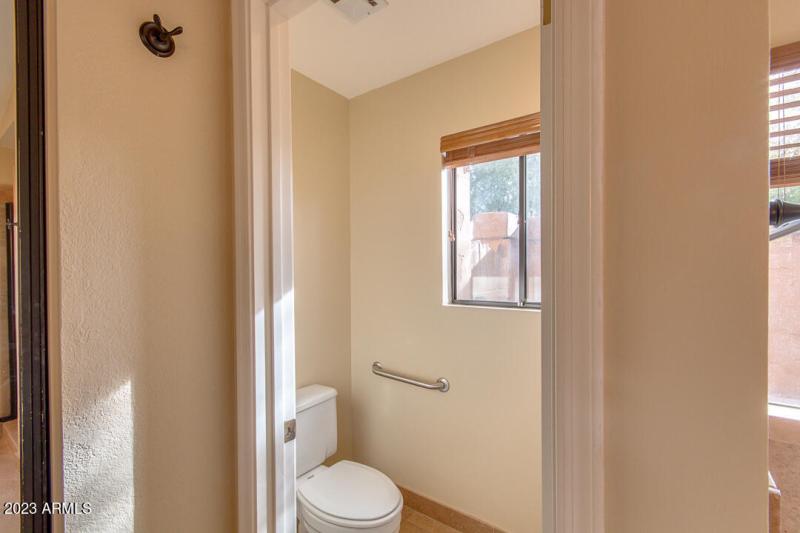 19. PRIVATE TOILET STALL IN MASTER BATHR