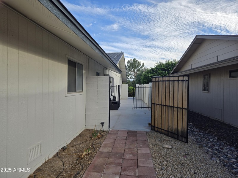 Gated storage or private patio on east