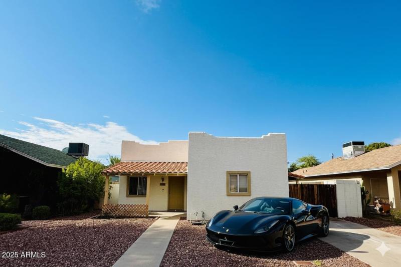 Front of Home with Vehicle