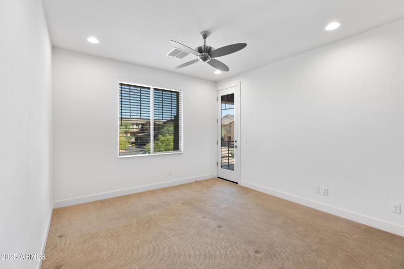 Primary Bedroom w/ Balcony