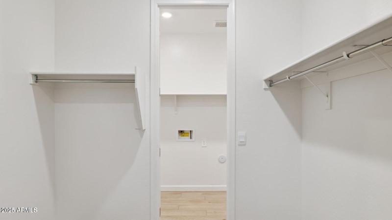 Lot 6 primary closet to laundry