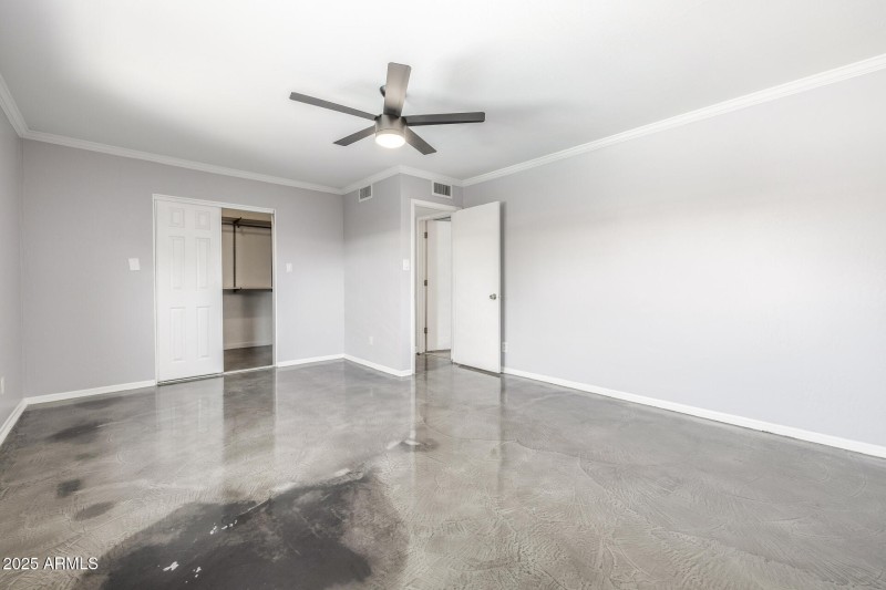 Primary bedroom with walk in closet
