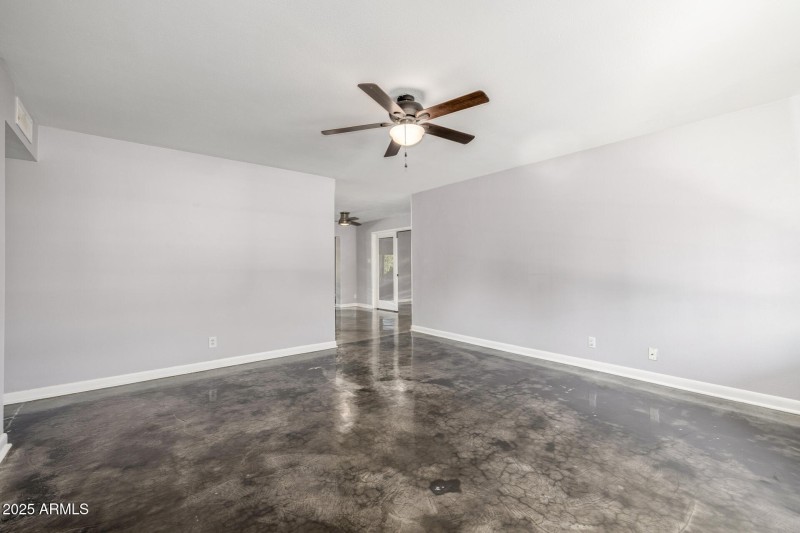 Living room with view of den or 5th bedr