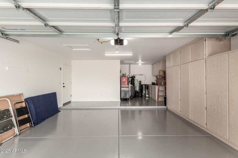 Garage with Built In Cabinets