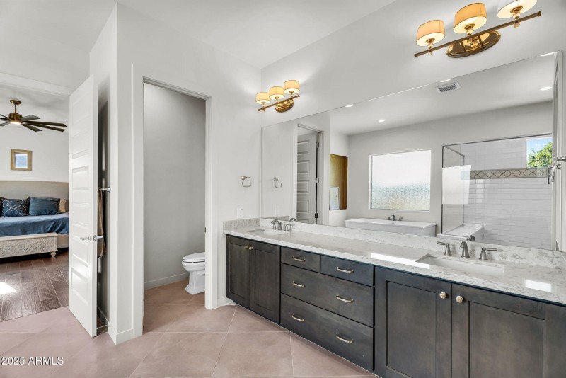 TWO private toilet rooms