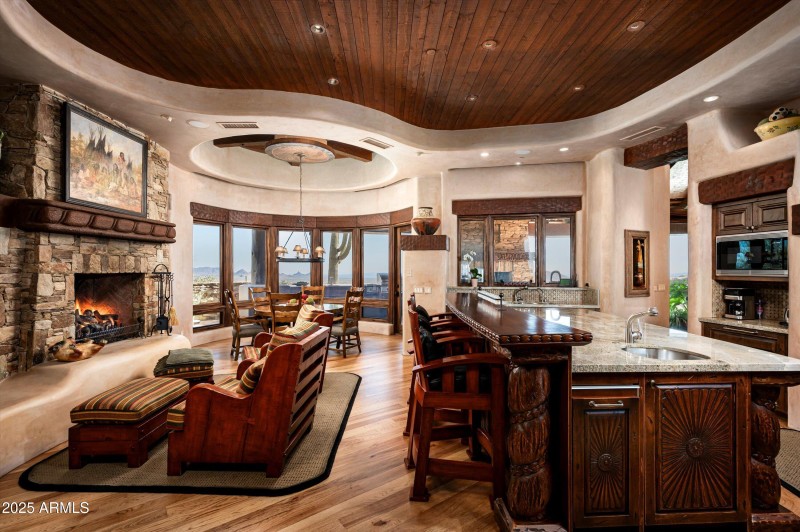 Kitchen with cozy stone fireplace