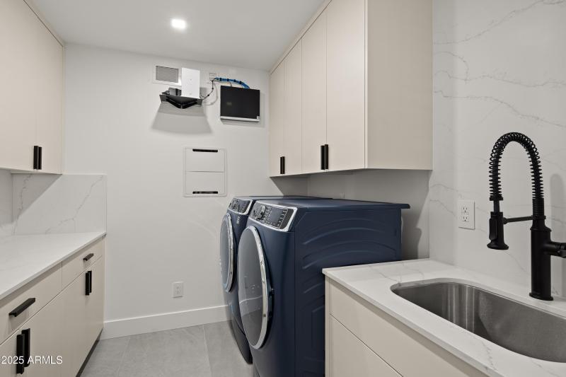 LAUNDRY ROOM WITH WASHER, DRYER, SINK