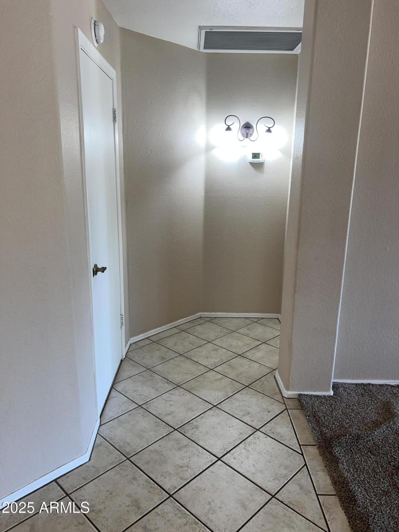 HALLWAY TO MAIN BEDROOM