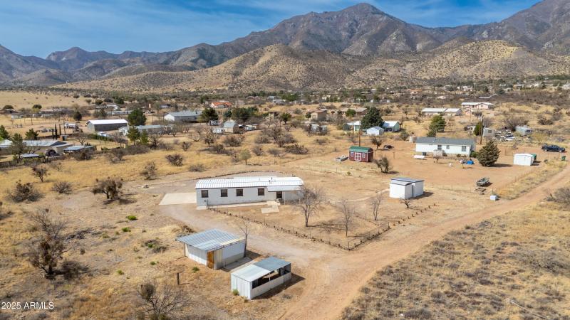 Chicken coup & horse stall in foreground