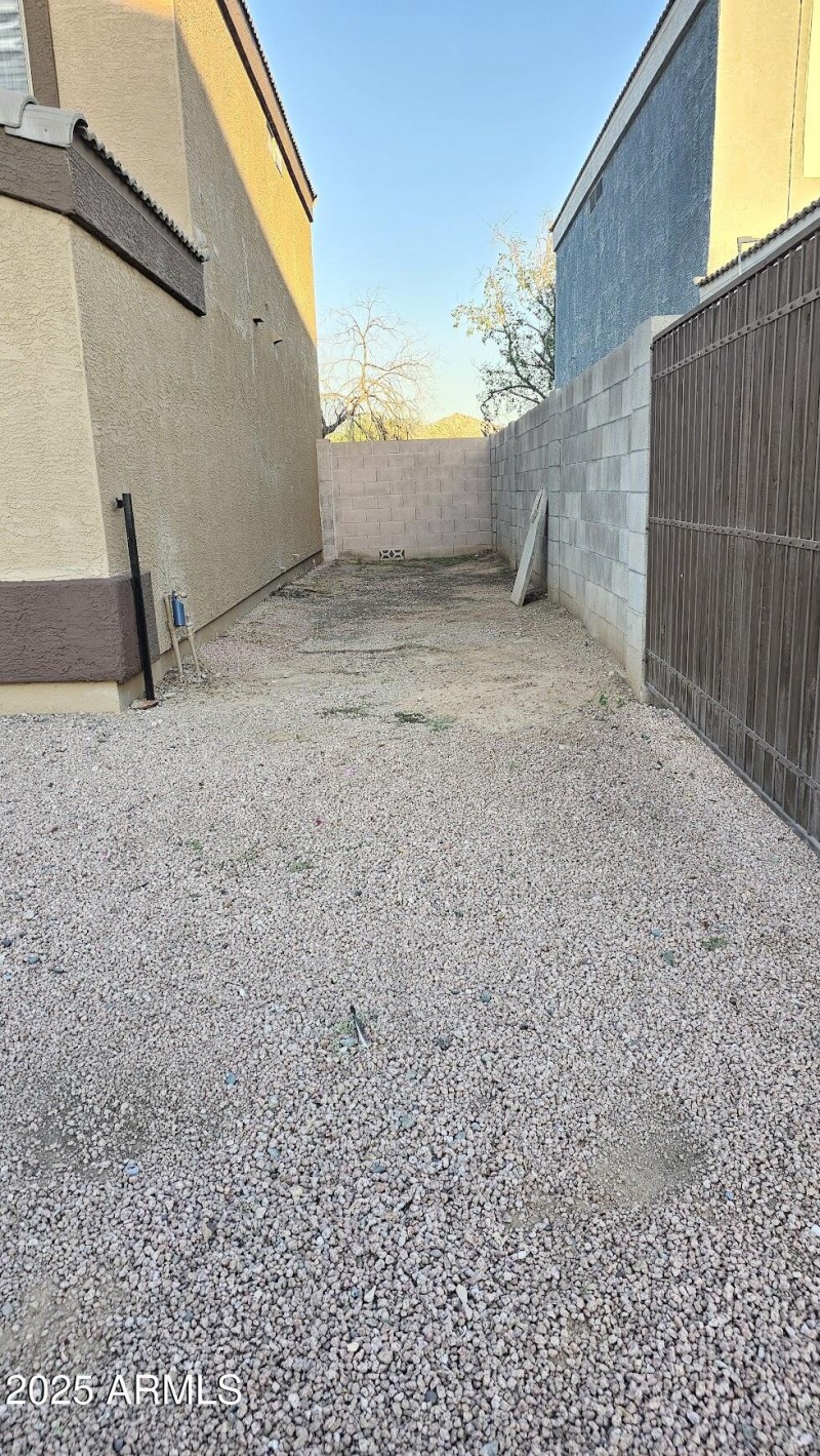 Gate on Side of Home for Extra Parking