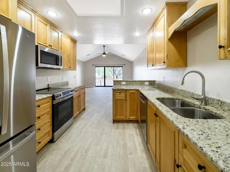 10 - Kitchen to Dining to Living Room