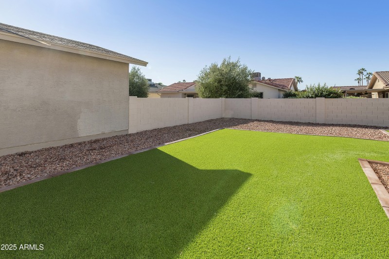 Yard with artificial turf