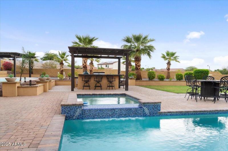 Pool with Elevated Spillover Spa