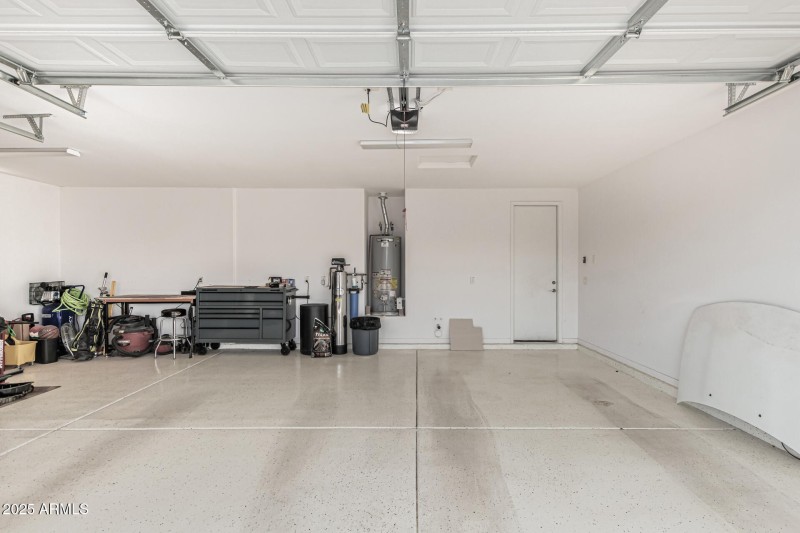 3 car garage view of 2 spots