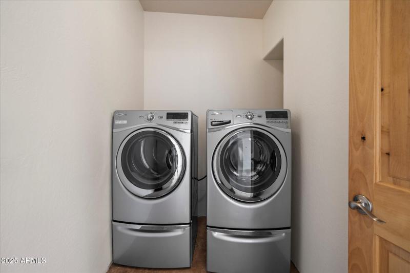 Inside spacious laundry