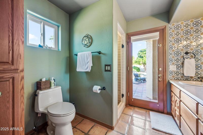 Bath with access to patio/pool area