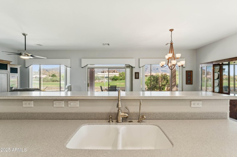 WALL OF WINDOWS FROM KITCHEN