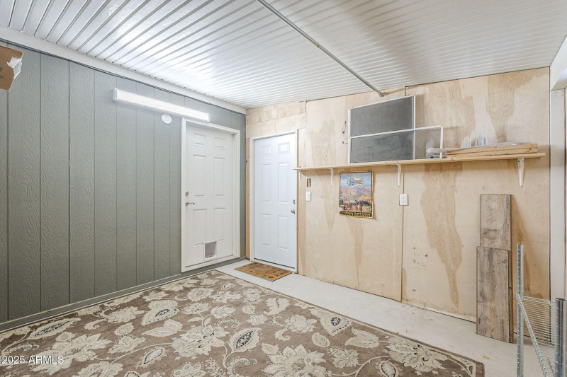 Shed with carport & house access