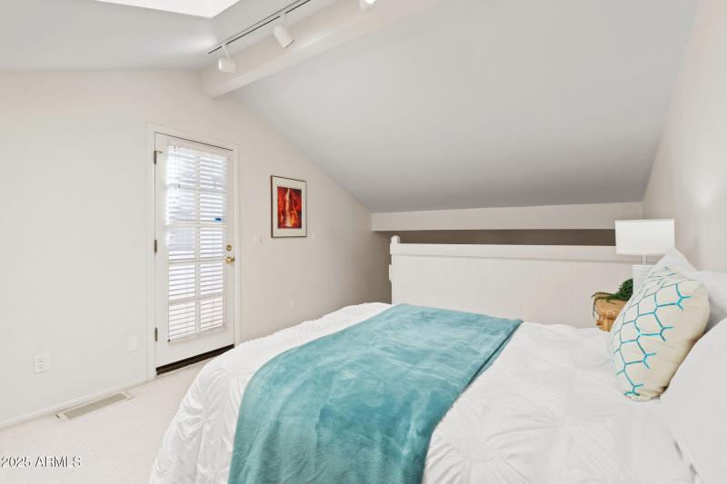 Loft w Vaulted Ceilings