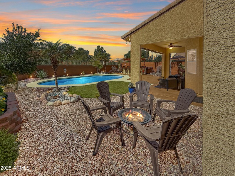 Cozy Firepit Seating with Pool Views