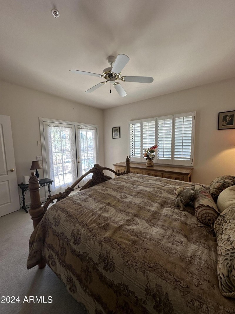 Bedroom 3 with door to pool