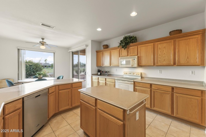 Bright Kitchen with Golf Course View