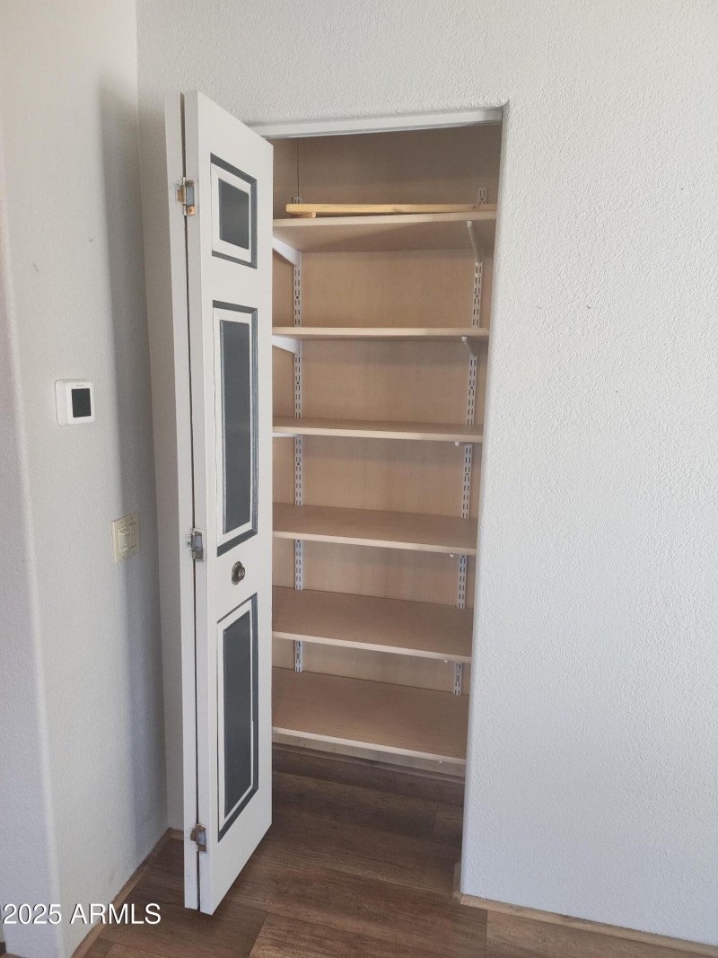 26. Living room Closet opened