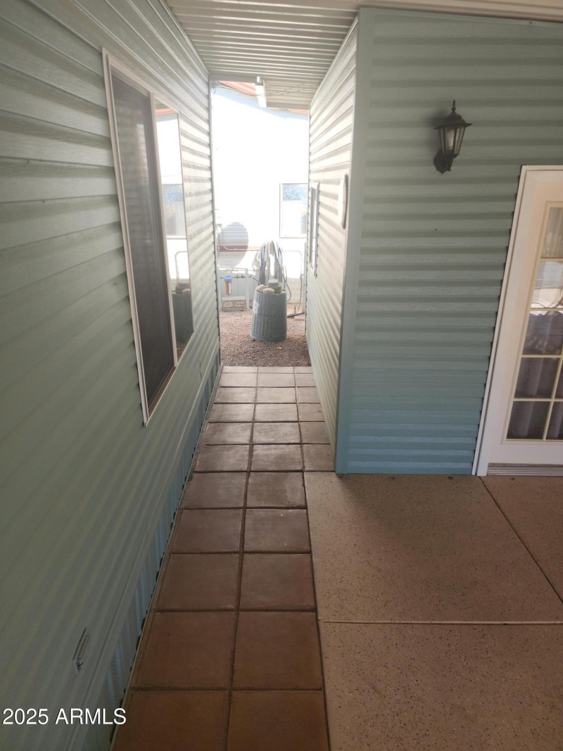 70. Pavers added to eact carport through