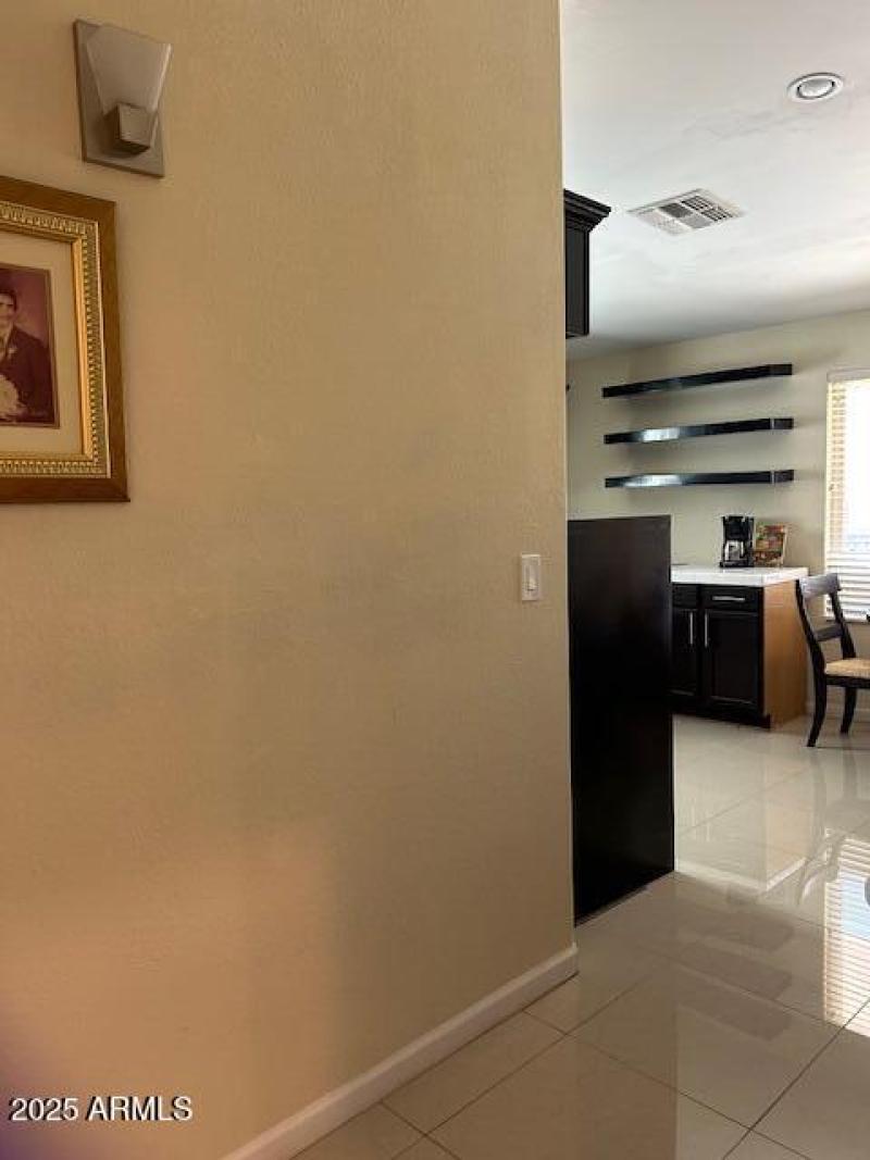 Flex hallway to open kitchen with breakf