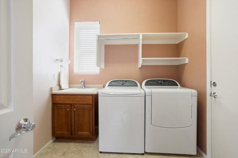 LAUNDRY ROOM WITH SINK.
