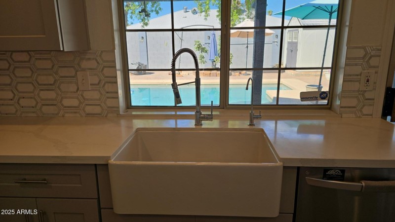 Kitchen window pool view