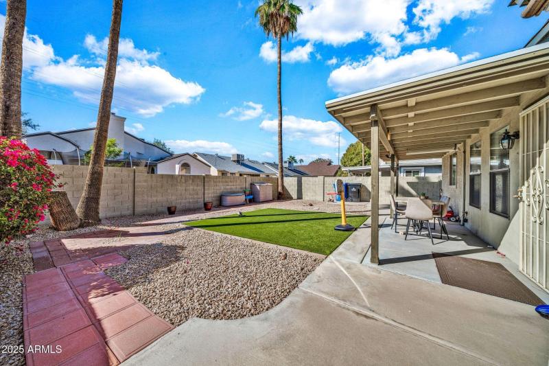 Backyard with grassy area