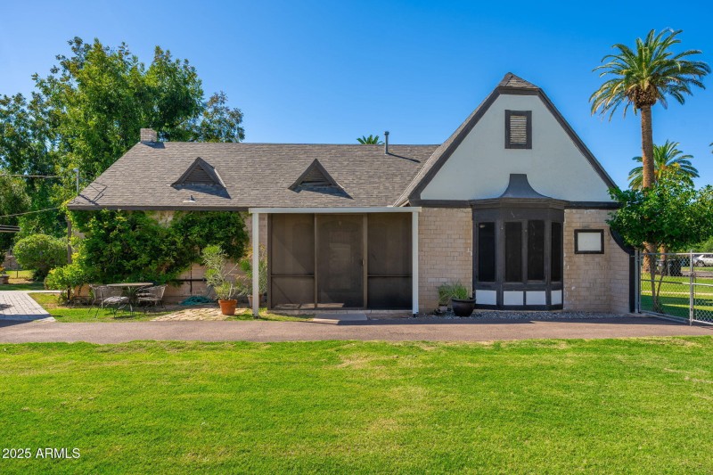 Enclosed patio east facing side of home