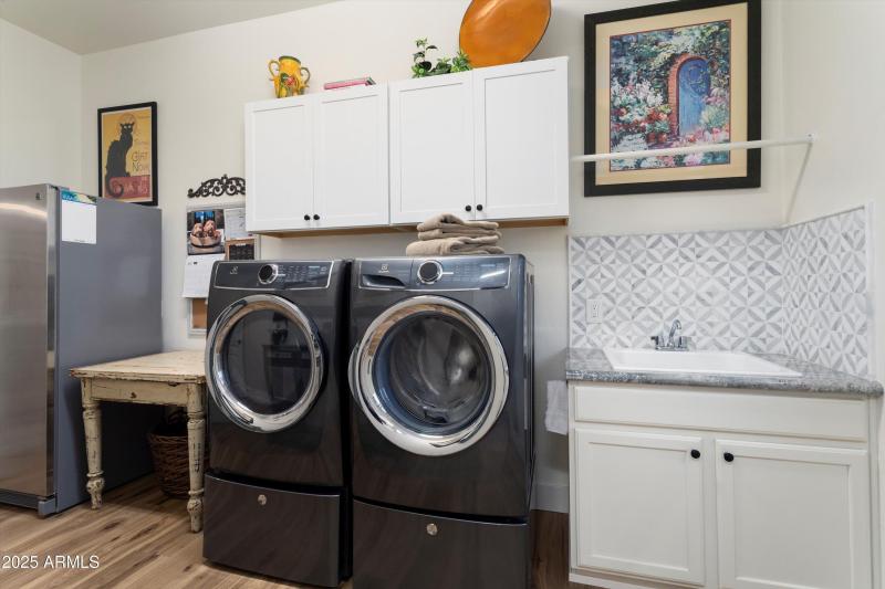 Laundry is spacious & has a sink!