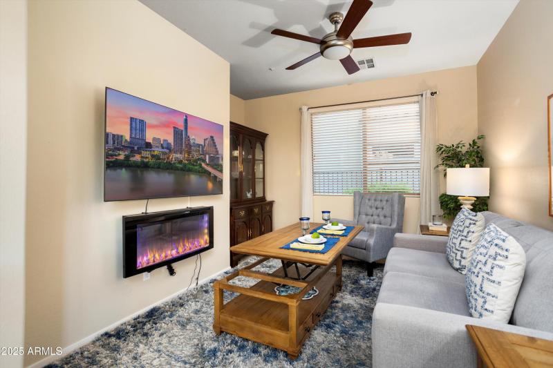 DEN USED AS A SITTING ROOM