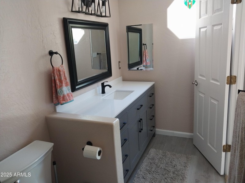 Updated cabinets & Mirrors in Primary
