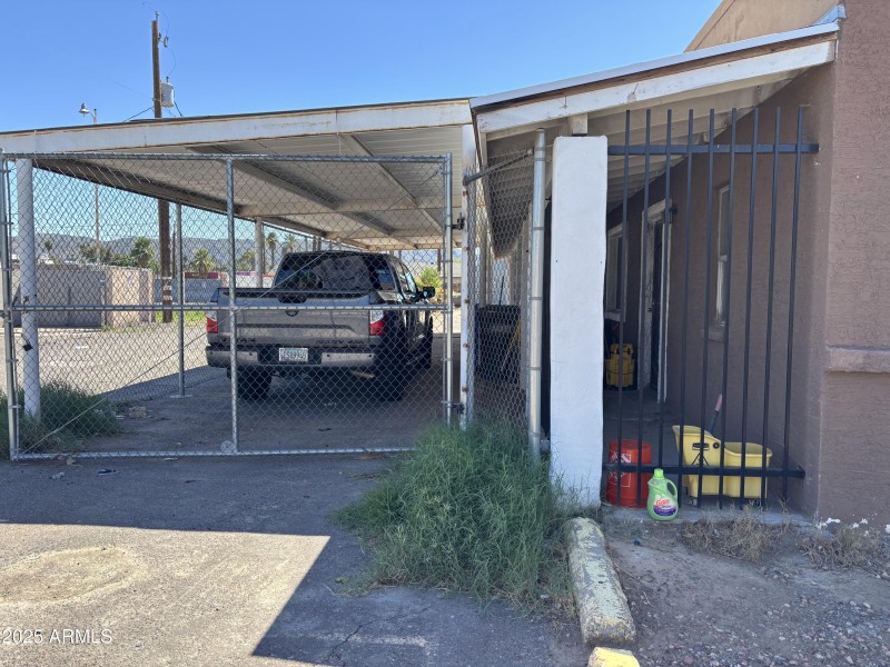 ENTRANCE TO COVERED PARKING