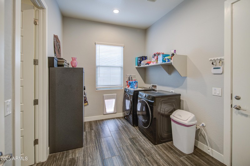 Laundry-access from hall and primary BR