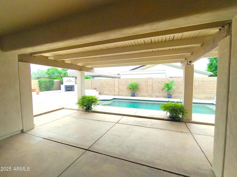 Back patio overlooking pool