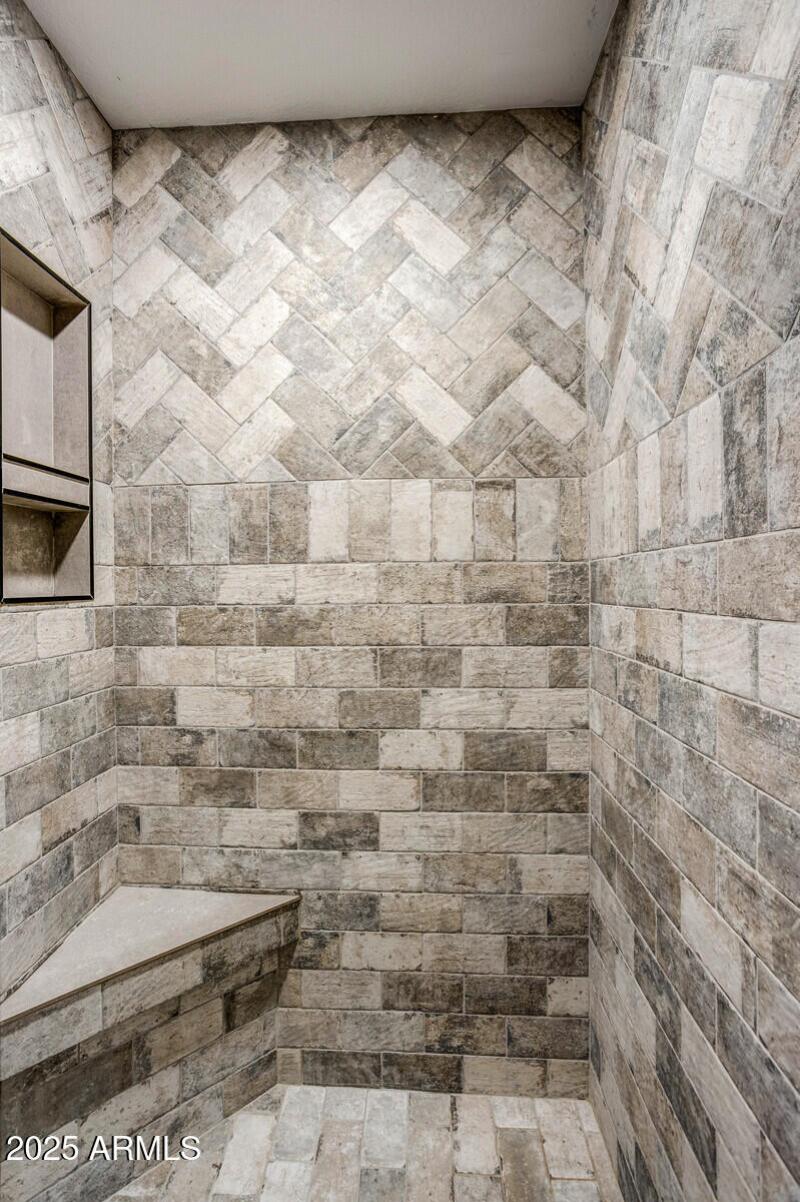 Impressive Tile Work in Primary Bathroom